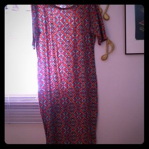 3 lularoe items and 1 pink shirt and 2 pixie pants